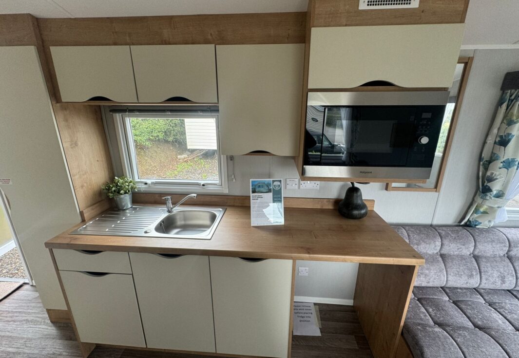 New Willerby Ashurst Static Caravan kitchen with integrated microwave