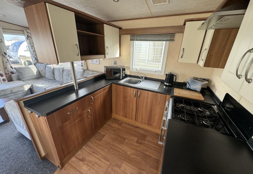 2012 Preowned ABI St David 38x12 3 Bed Static Caravan two tone kitchen